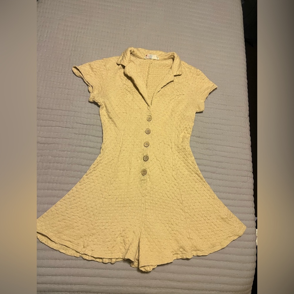 Free people romper like new! Worn a few times but looks like new.